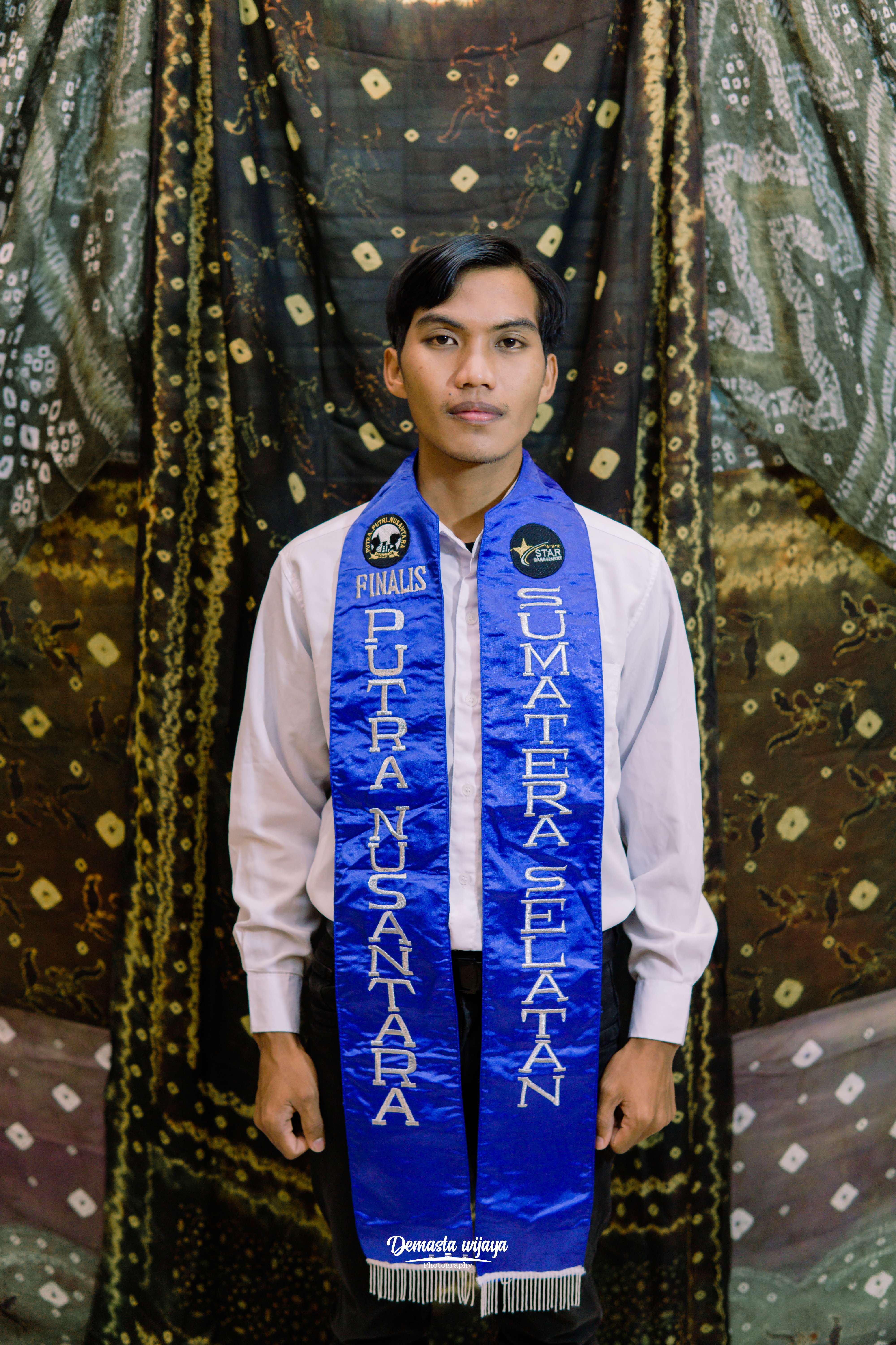 RAHMAT HUJANI